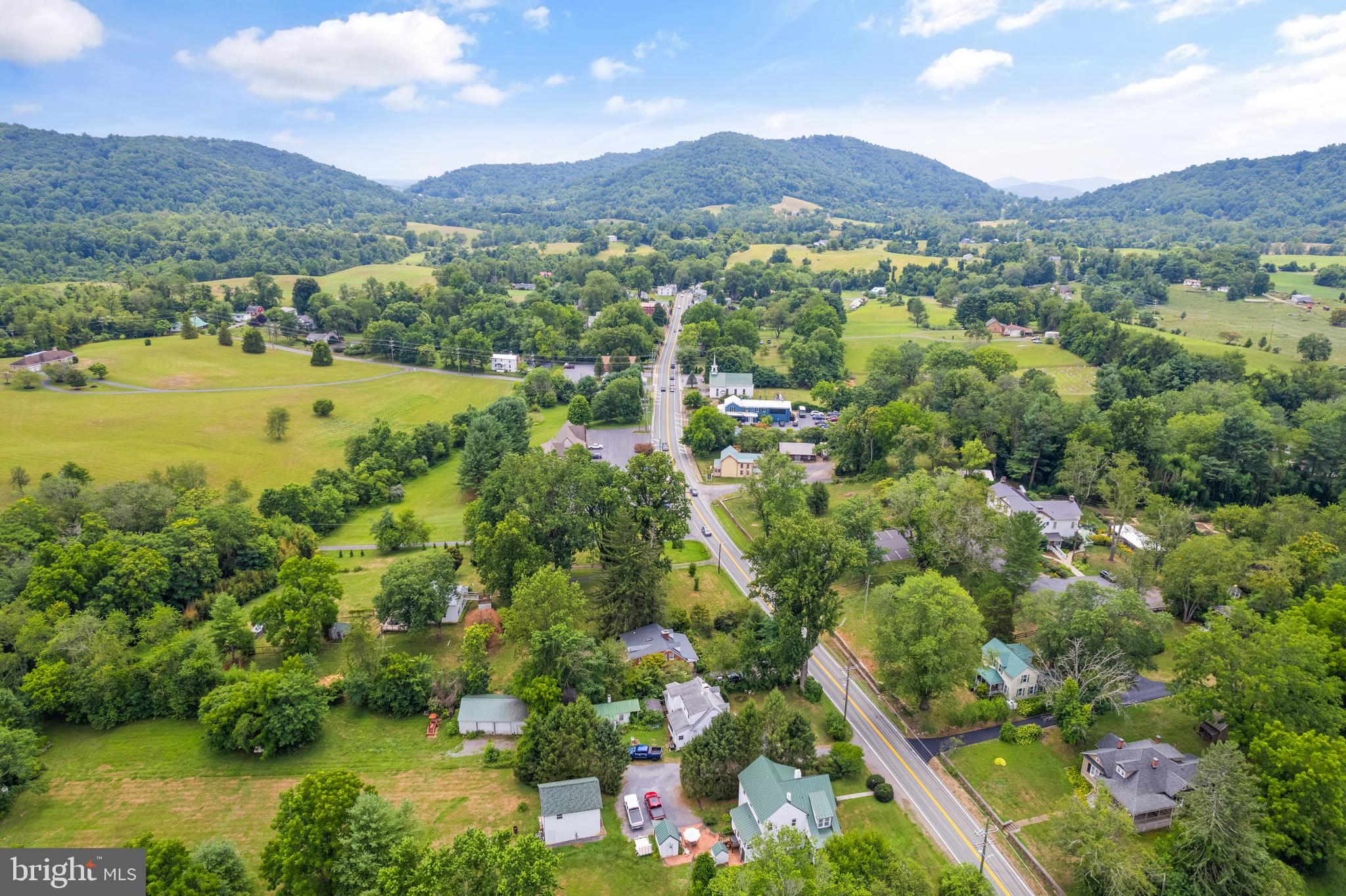 Aileen Road Flint Hill, VA 22627 - Photo 18 of 23 a view of a lake with mountains in the background