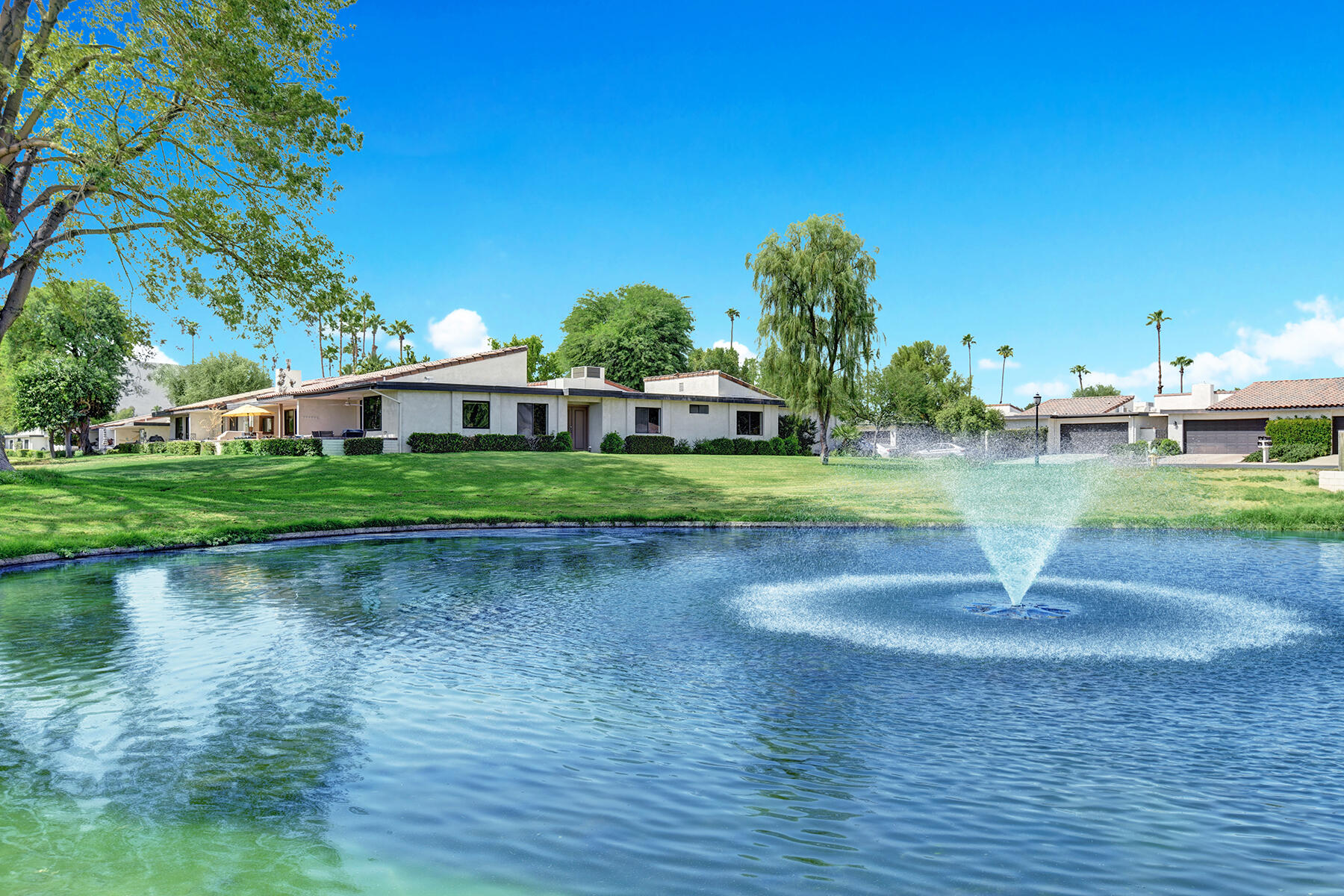 29 Padron Way Rancho Mirage, CA 92270 - Photo 1 of 39 OVER LAKE TO HOME.jpg mls