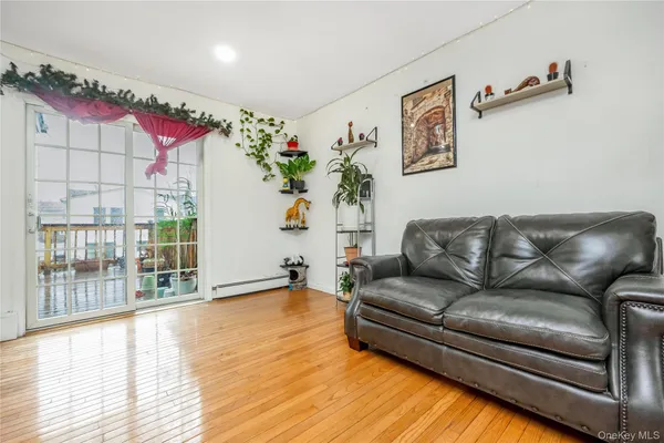 a living room with furniture with wooden floor