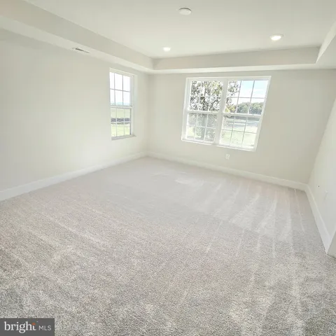 a bathroom with a toilet a sink and a shower