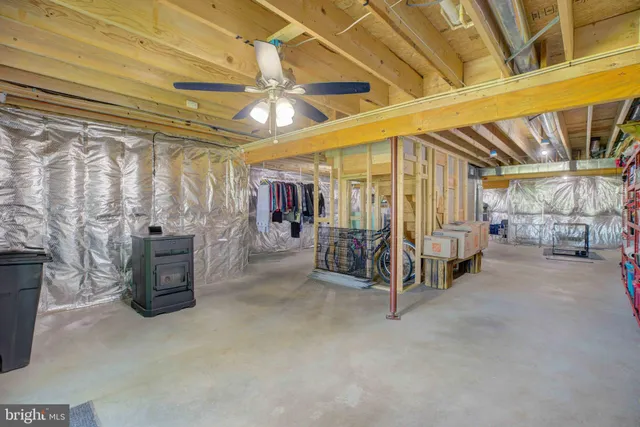 a view of a room with lots of white furniture