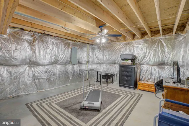 a view of a gym with wooden floor