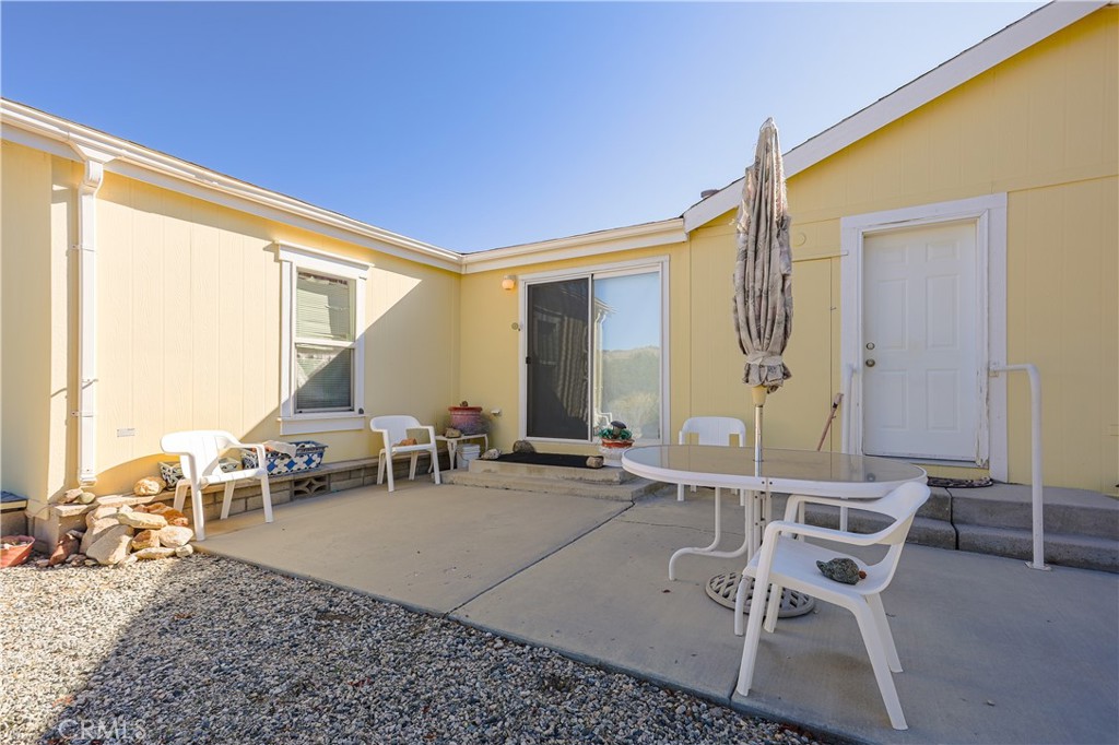 29520 Piani Road Pearblossom, CA 93553 - Photo 31 of 34 a living room with furniture and a large window