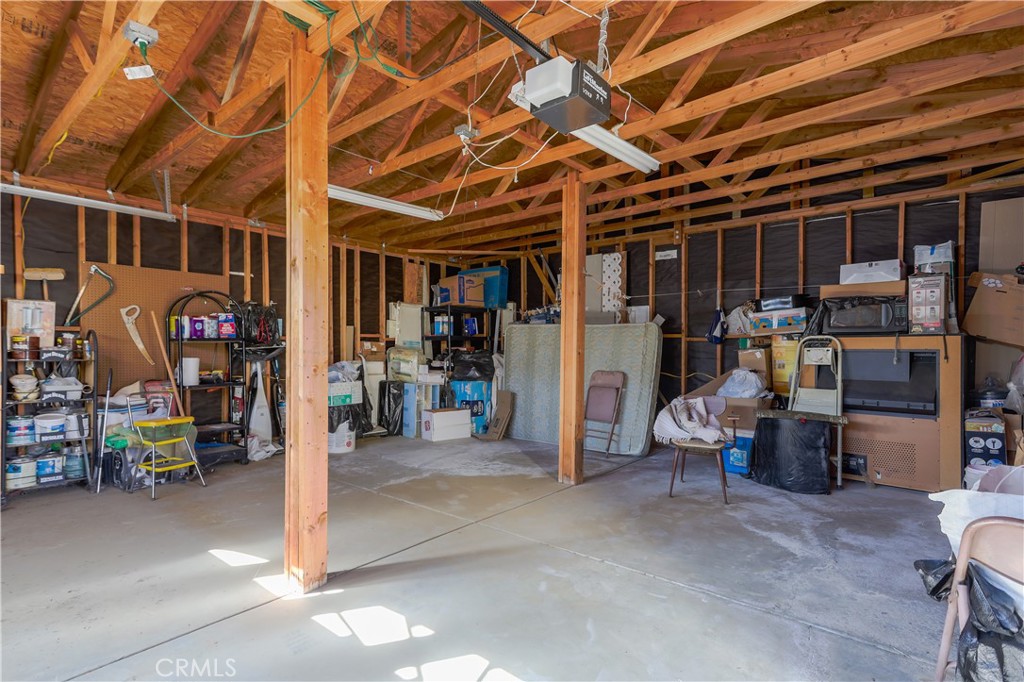 29520 Piani Road Pearblossom, CA 93553 - Photo 10 of 34 a view of a storage room with racks