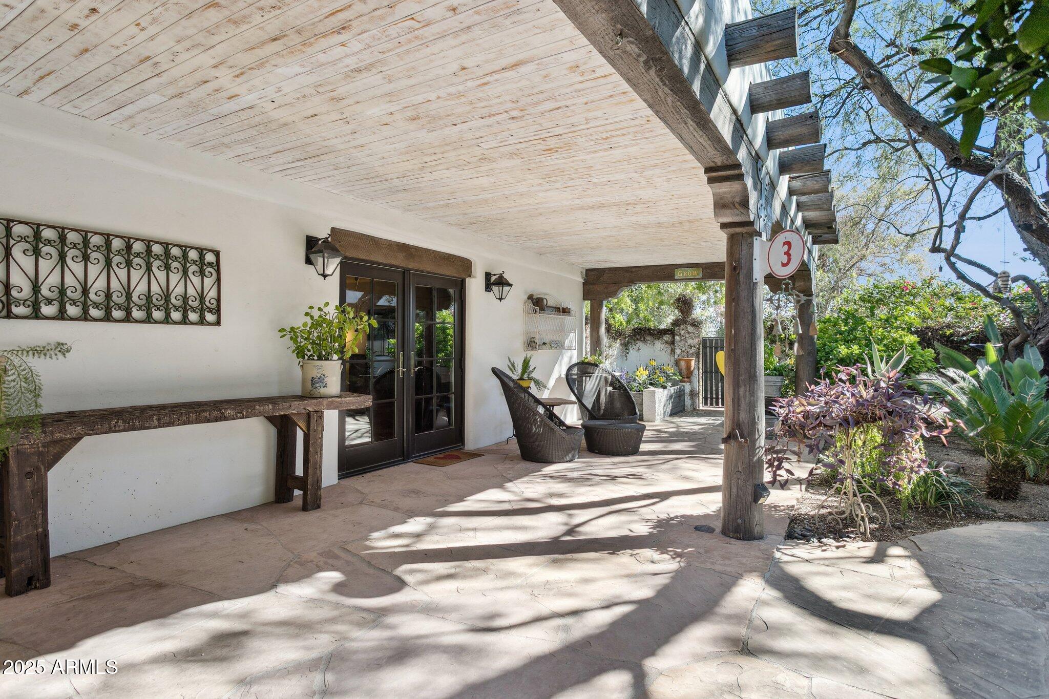 7005 East Jackrabbit Road Paradise Valley, AZ 85253 - Photo 24 of 61 a view of a entryway door of the house