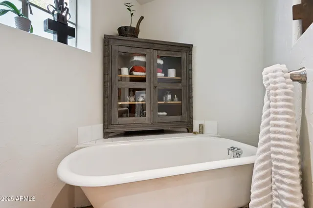 a view of a chairs and table in the patio