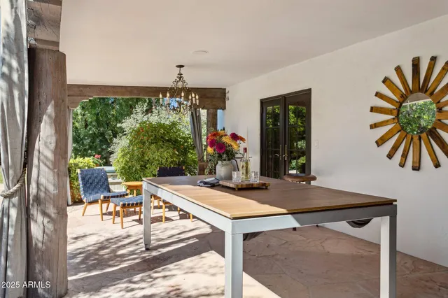 a view of a swimming pool with a yard