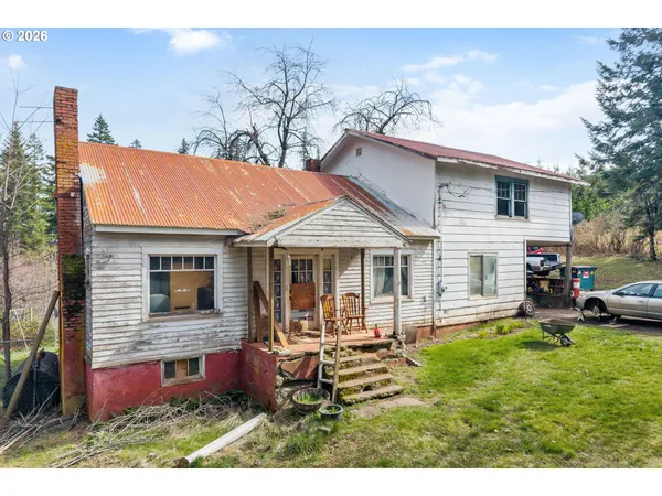 a aerial view of a house with garden