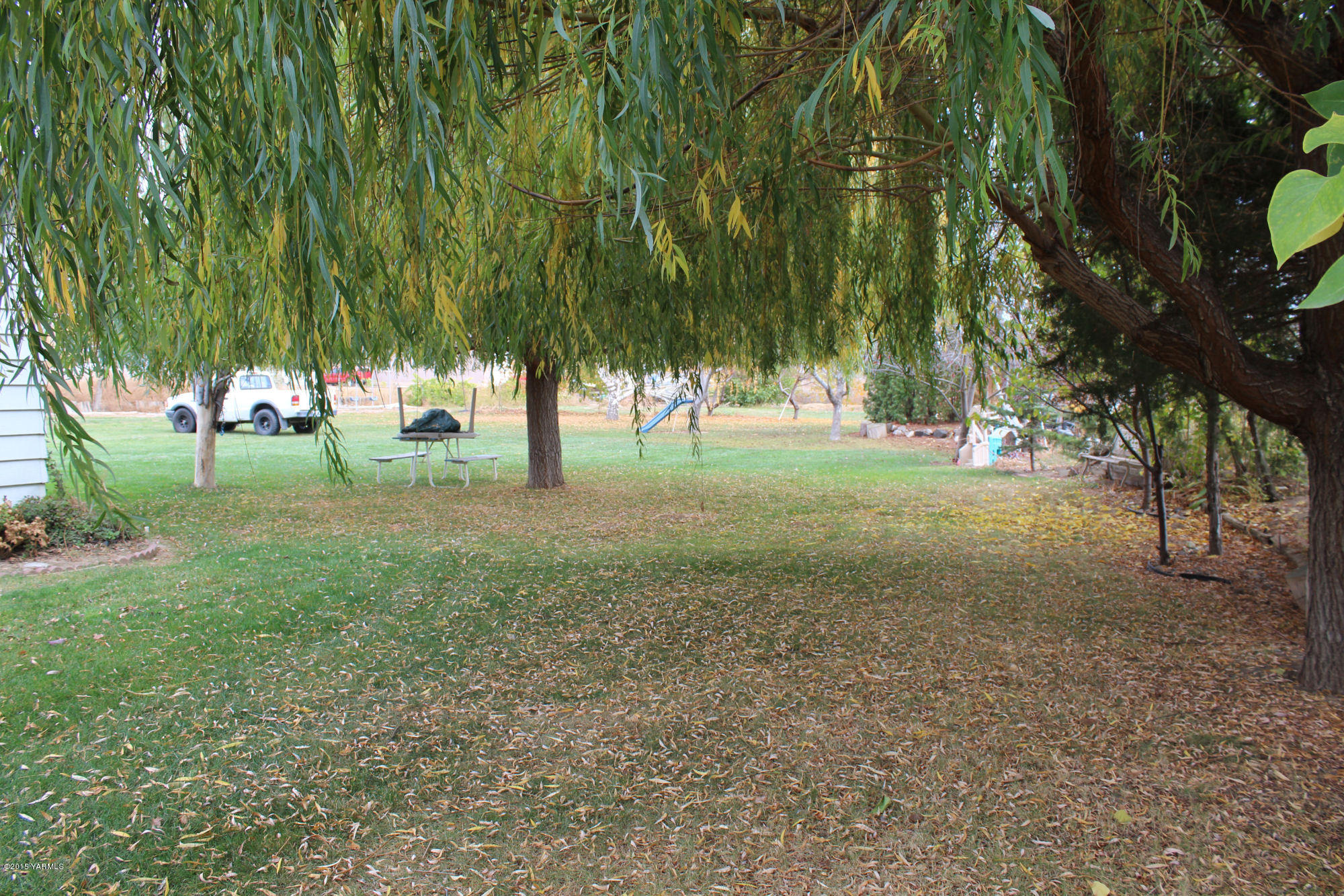 5205 Postma Road Yakima, WA 98901 - Photo 2 of 13 a view of a trees with a park