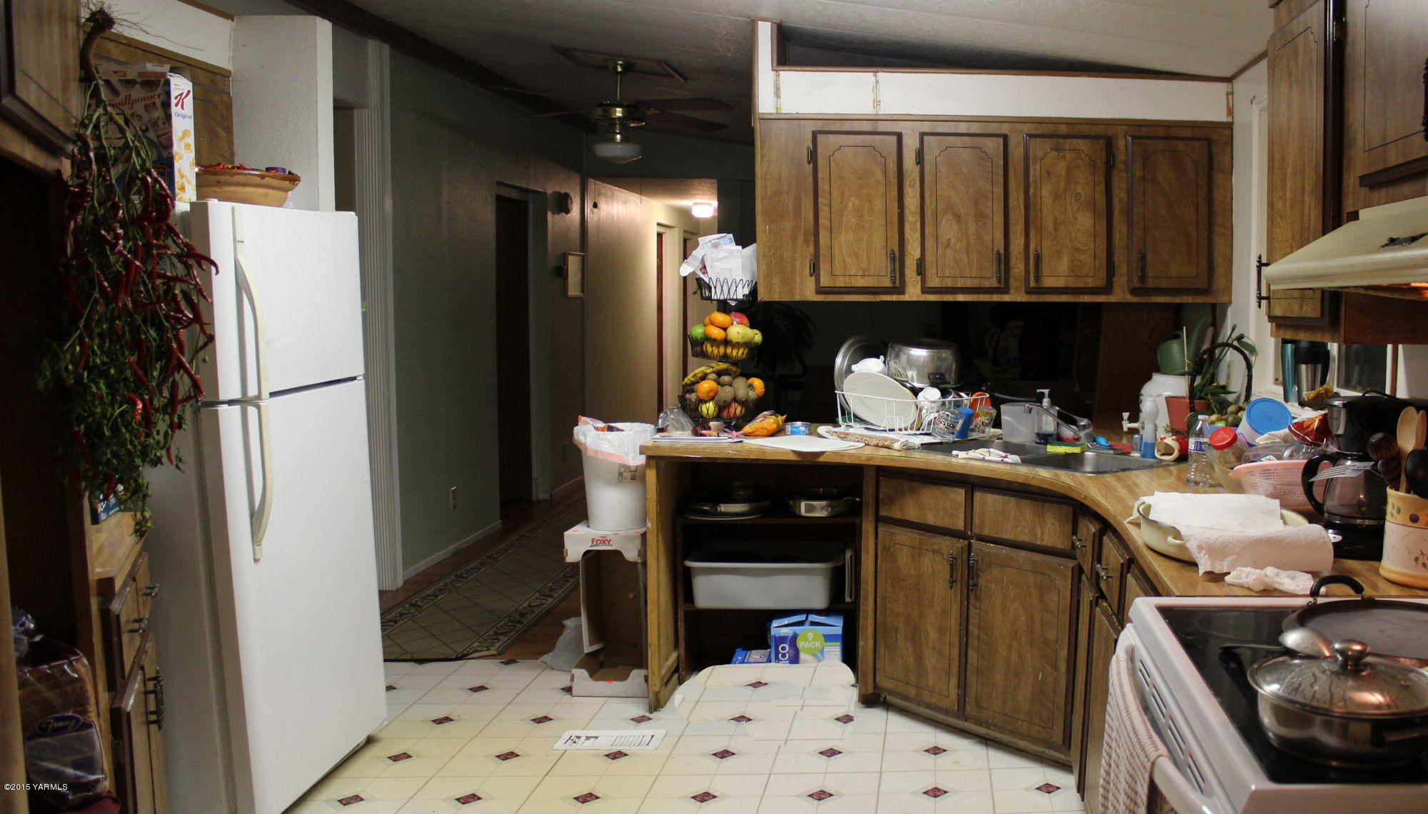 5205 Postma Road Yakima, WA 98901 - Photo 6 of 13 a kitchen with a sink and cabinets