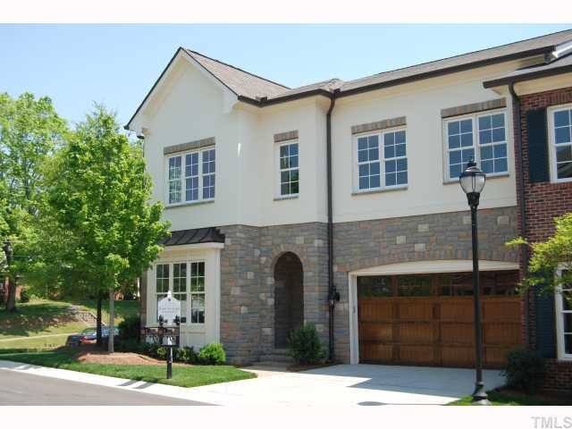 2603 Graves Court Raleigh, NC 27608 - Photo 1 of 4 End unit townhome accented by stone and stucco exteriors. Walking distance to shops, restaurants and churches.