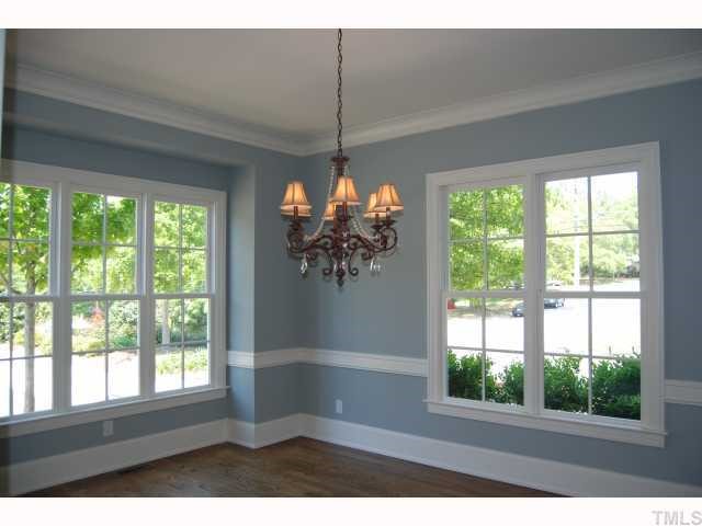 2603 Graves Court Raleigh, NC 27608 - Photo 3 of 4 Formal dining room--gorgeous hardwood floors, chair railing, and lots of windows