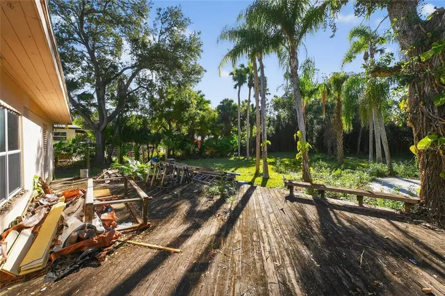 a living room with furniture fireplace and flat screen tv