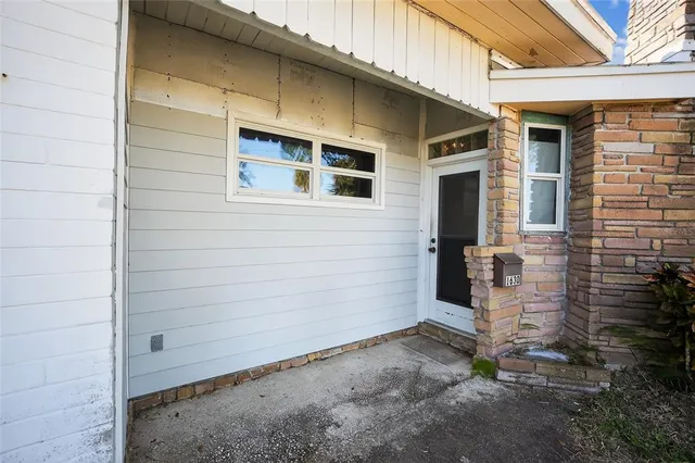 a kitchen with a stove and a refrigerator