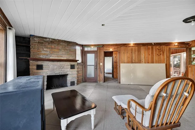 a kitchen with stainless steel appliances a stove a sink and a microwave