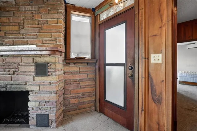 a kitchen with stainless steel appliances a stove a sink and a microwave