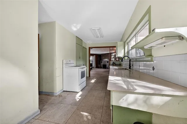 an aerial view of residential house with outdoor space