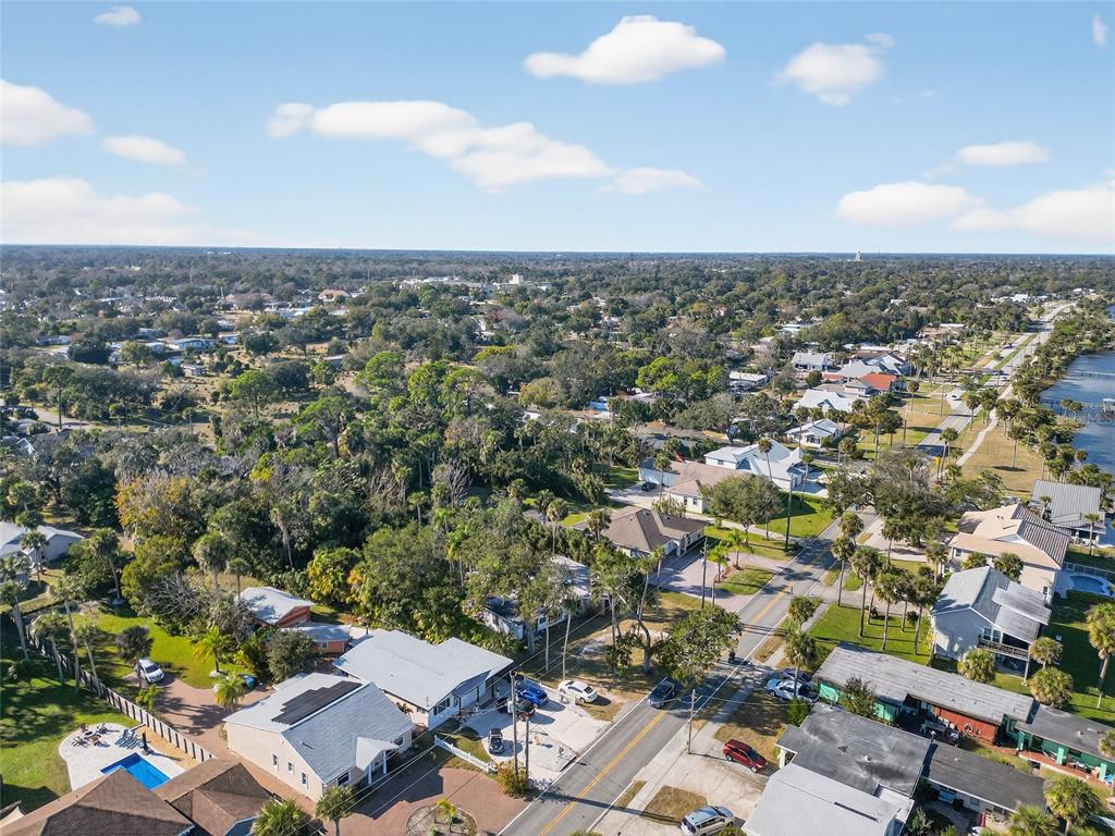 1630 Riverside Drive Daytona Beach, FL 32117 - Photo 42 of 62 an aerial view of a city with lots of residential buildings
