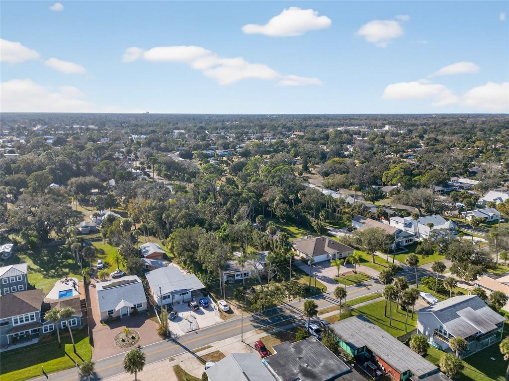 1630 Riverside Drive Daytona Beach, FL 32117 - Photo 43 of 62 an aerial view of residential houses with outdoor space