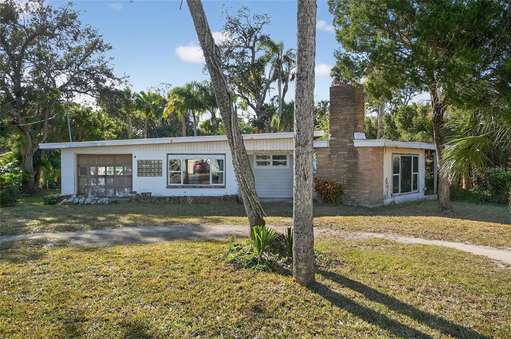 1630 Riverside Drive Daytona Beach, FL 32117 - Photo 54 of 62 front view of a house with a yard