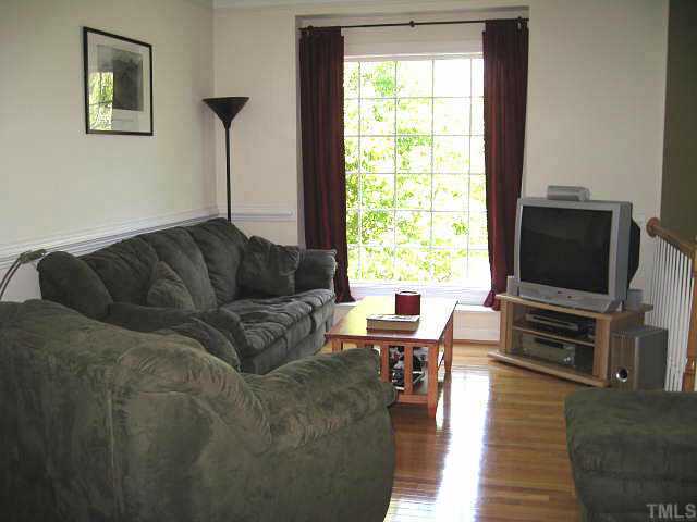 5444 Vista View Court Raleigh, NC 27612 - Photo 3 of 12 Lovely living room with chair rail & large window