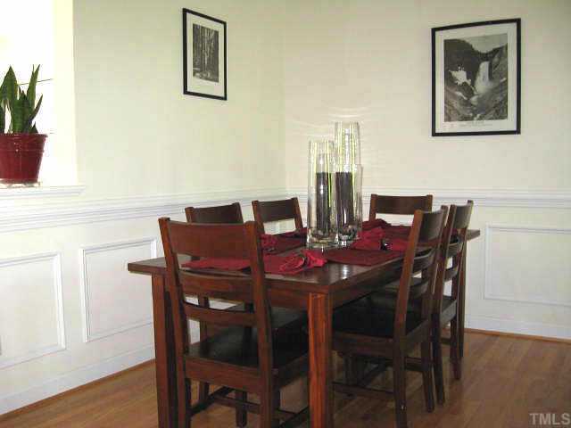 5444 Vista View Court Raleigh, NC 27612 - Photo 4 of 12 Convenient dining area with chair rail/wainscot & hardwoods