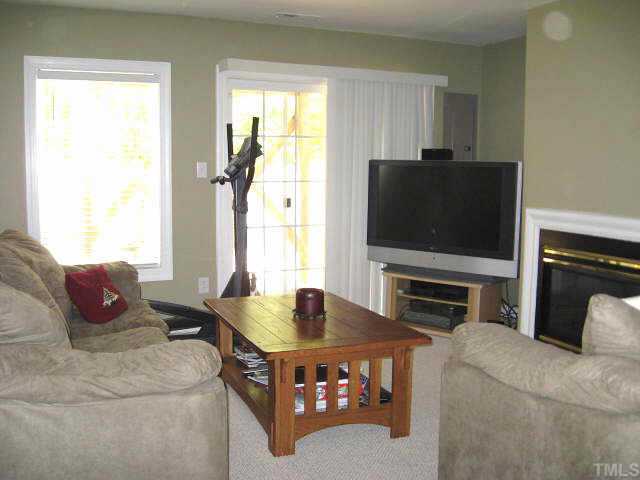5444 Vista View Court Raleigh, NC 27612 - Photo 7 of 12 Great family room with gas log fireplace; could be a rec or media room