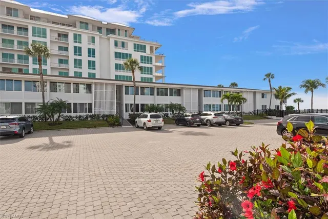 a cars parked in front of a building