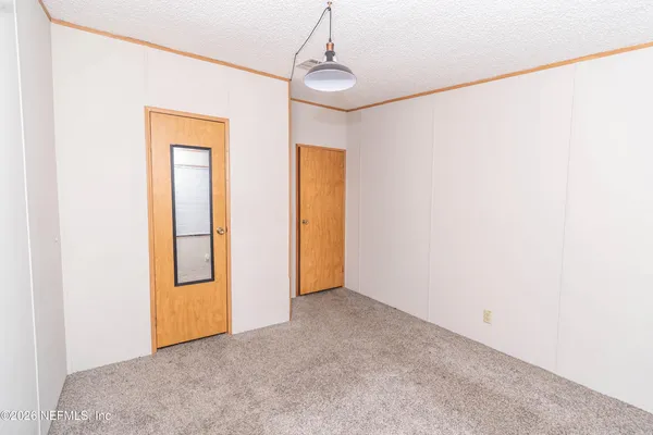 a view of an empty room with window