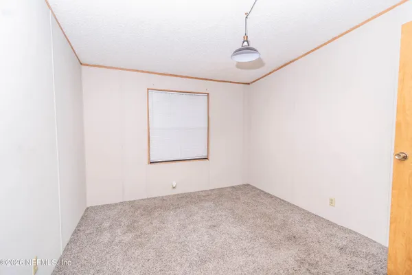 a view of a small space with a window