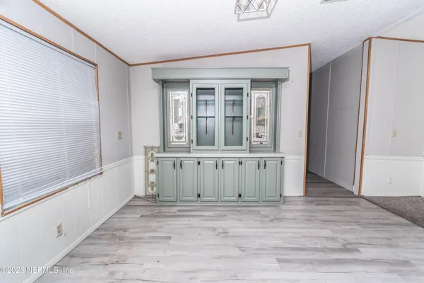 a view of a house with wooden floor