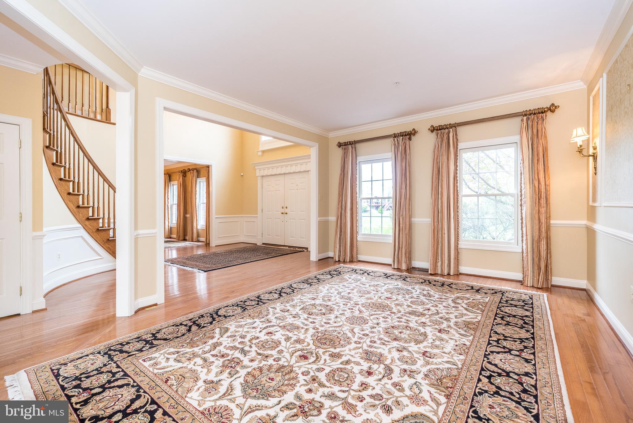 2517 Lockleigh Road Jamison, PA 18929 - Photo 14 of 72 a view of an empty room with wooden floor and a fireplace