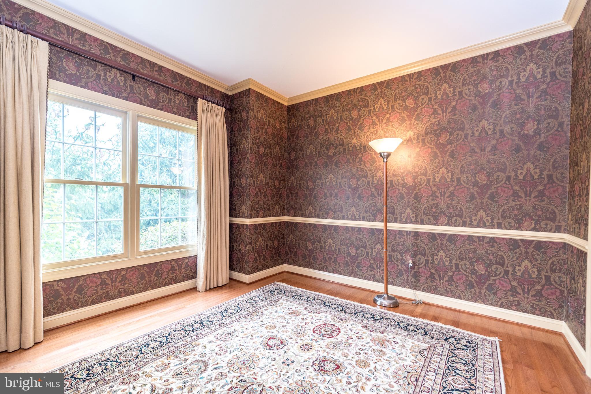 2517 Lockleigh Road Jamison, PA 18929 - Photo 16 of 72 a view of a big room with wooden floor and windows