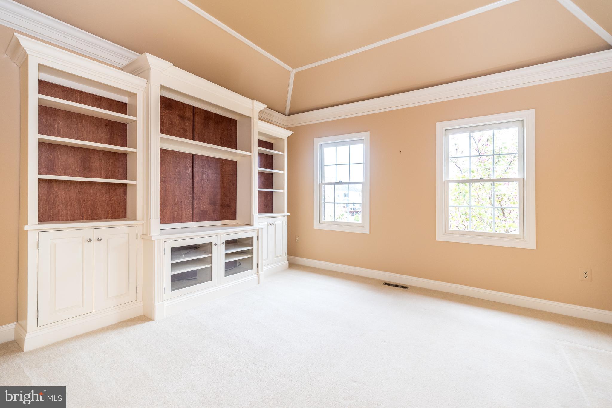 2517 Lockleigh Road Jamison, PA 18929 - Photo 39 of 72 an empty room with windows and cabinet