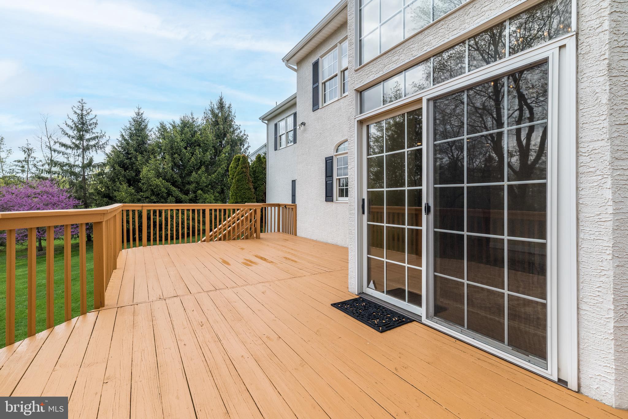 2517 Lockleigh Road Jamison, PA 18929 - Photo 57 of 72 a view of a balcony with floor to ceiling windows and wooden floor