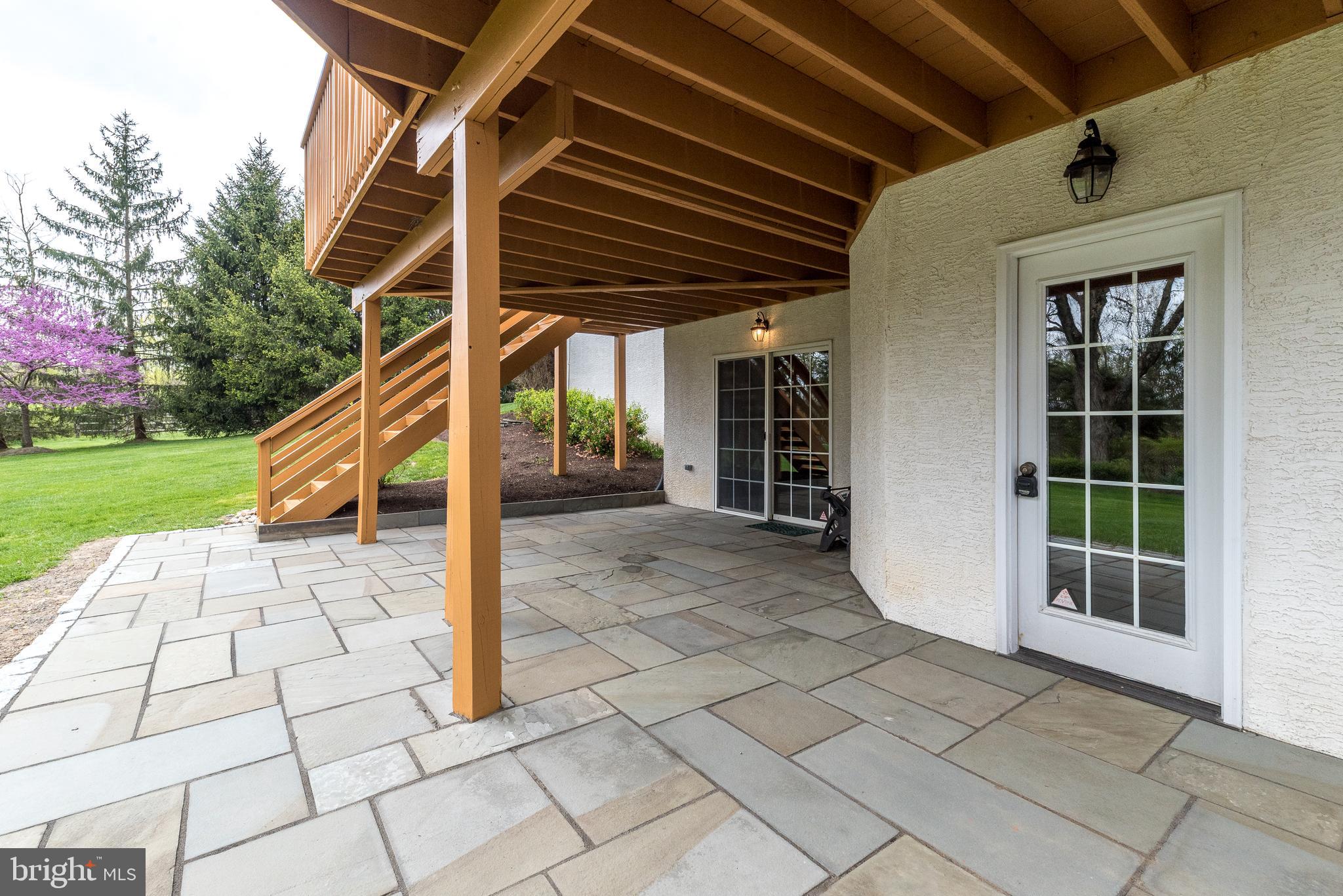 2517 Lockleigh Road Jamison, PA 18929 - Photo 60 of 72 Blue Stone Patio at Basement Walk-out