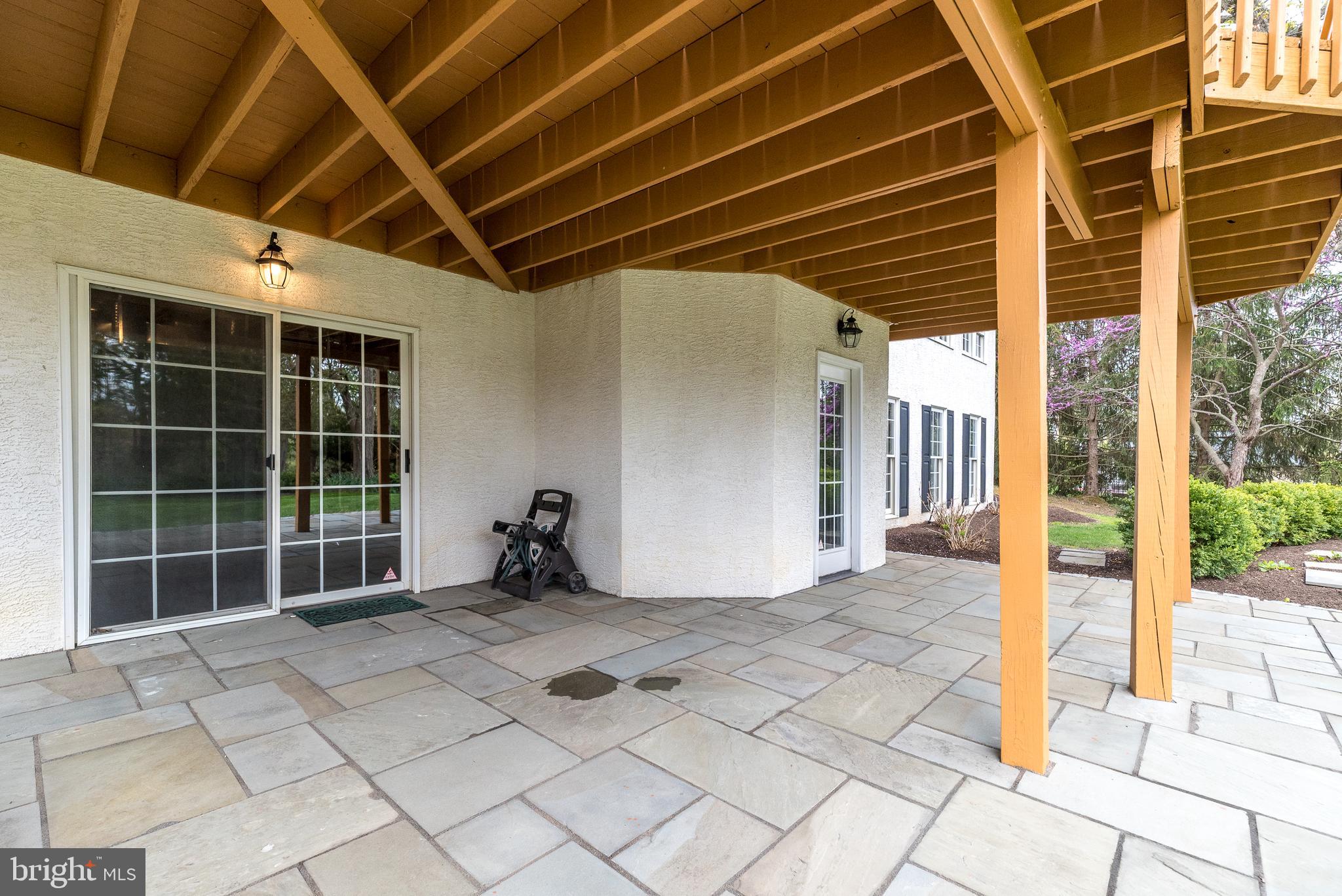 2517 Lockleigh Road Jamison, PA 18929 - Photo 61 of 72 Blue Stone Patio at Basement Walk-out