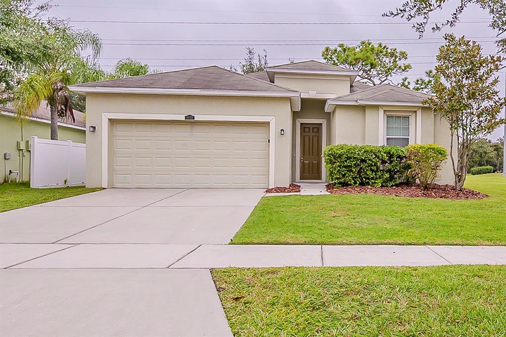front view of a house and a yard