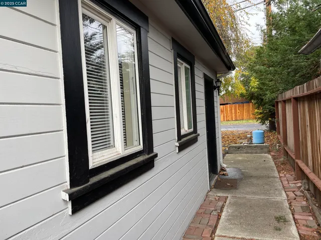 a view of a balcony with wooden floor