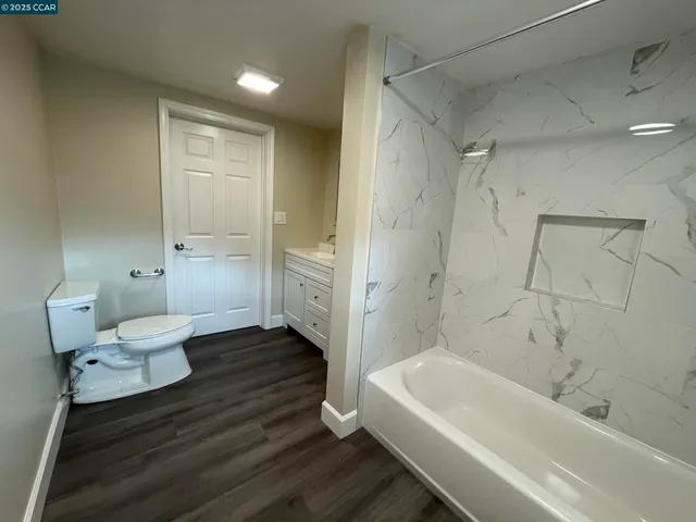 a bathroom with a sink and a bathtub