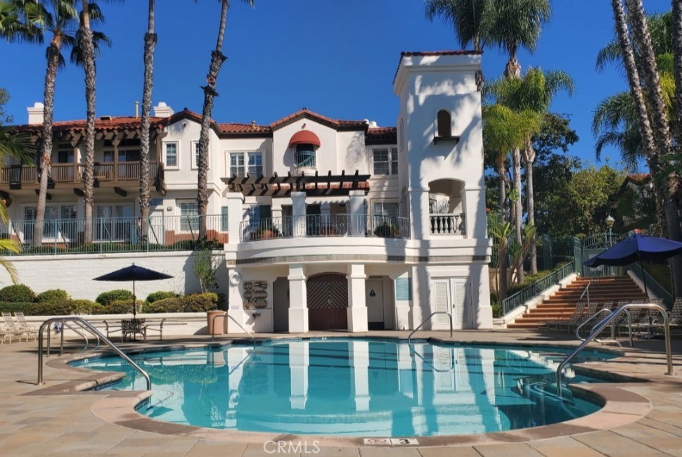 2827 Player Tustin, CA 92782 - Photo 13 of 15 a view of a building with a swimming pool