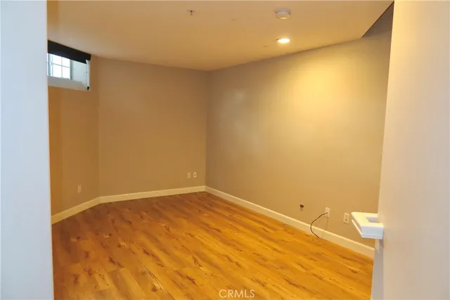 a bathroom with a sink mirror and toilet