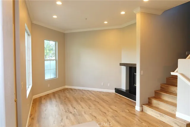 a kitchen with a refrigerator and a sink