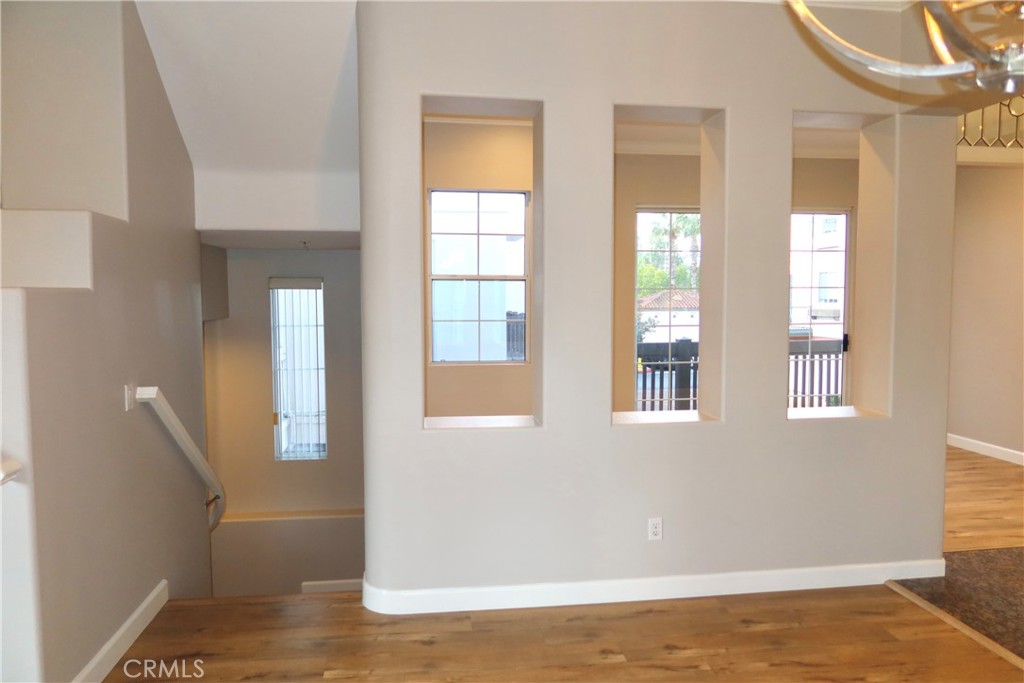 2827 Player Tustin, CA 92782 - Photo 25 of 42 a view of an empty room with glass door and windows