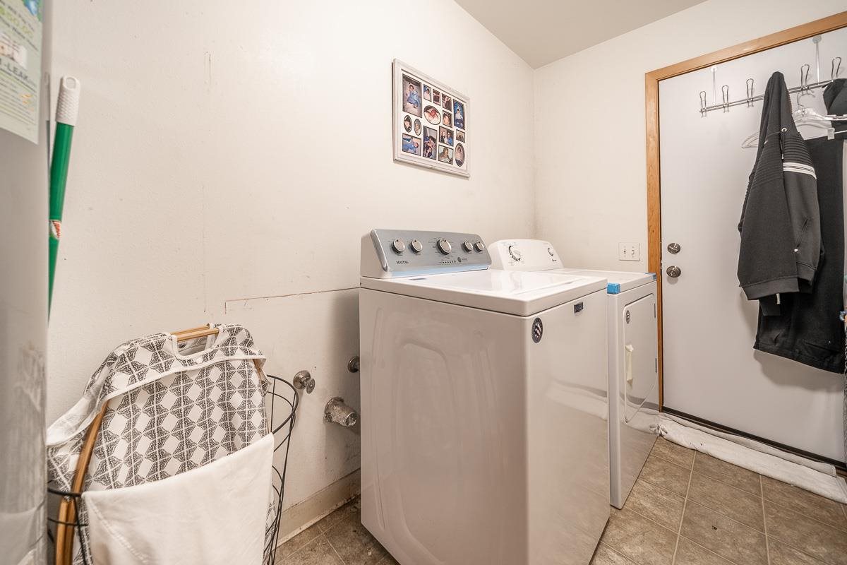 99 Hiipali Loop Kula, HI 96790 - Photo 13 of 16 a utility room with dryer and washer