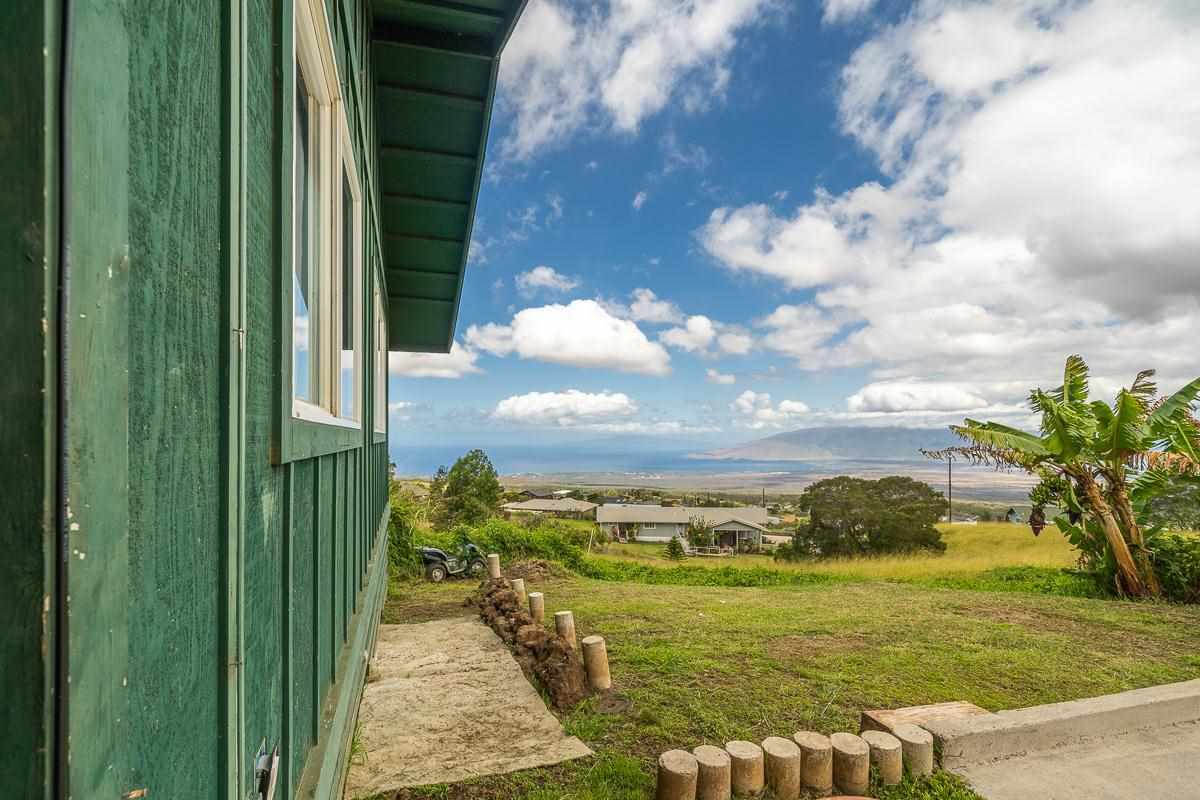 99 Hiipali Loop Kula, HI 96790 - Photo 15 of 16 a view of a lake with a big yard