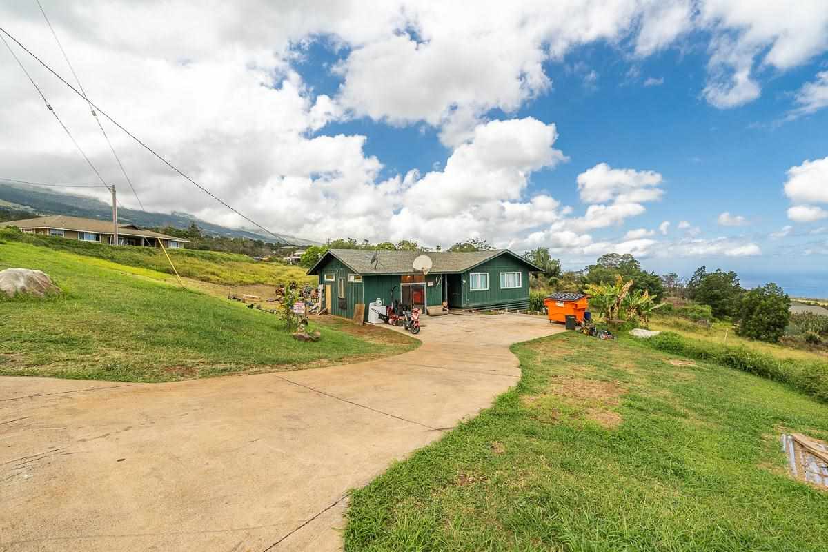 99 Hiipali Loop Kula, HI 96790 - Photo 16 of 16 a front view of a house with garden