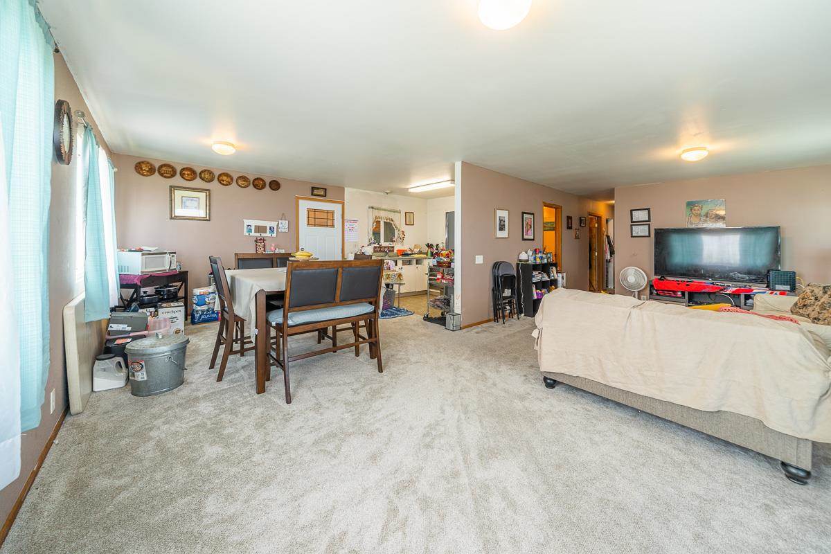 99 Hiipali Loop Kula, HI 96790 - Photo 8 of 16 a living room with furniture and a flat screen tv