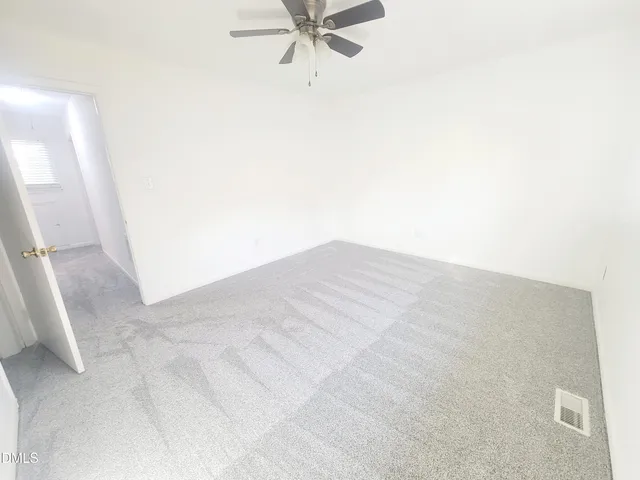 a bathroom with a sink a toilet and a shower