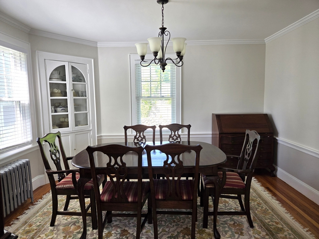 25 Waldeck Road Milton, MA 02186 - Photo 7 of 34 a view of a dining room with furniture window and outside view